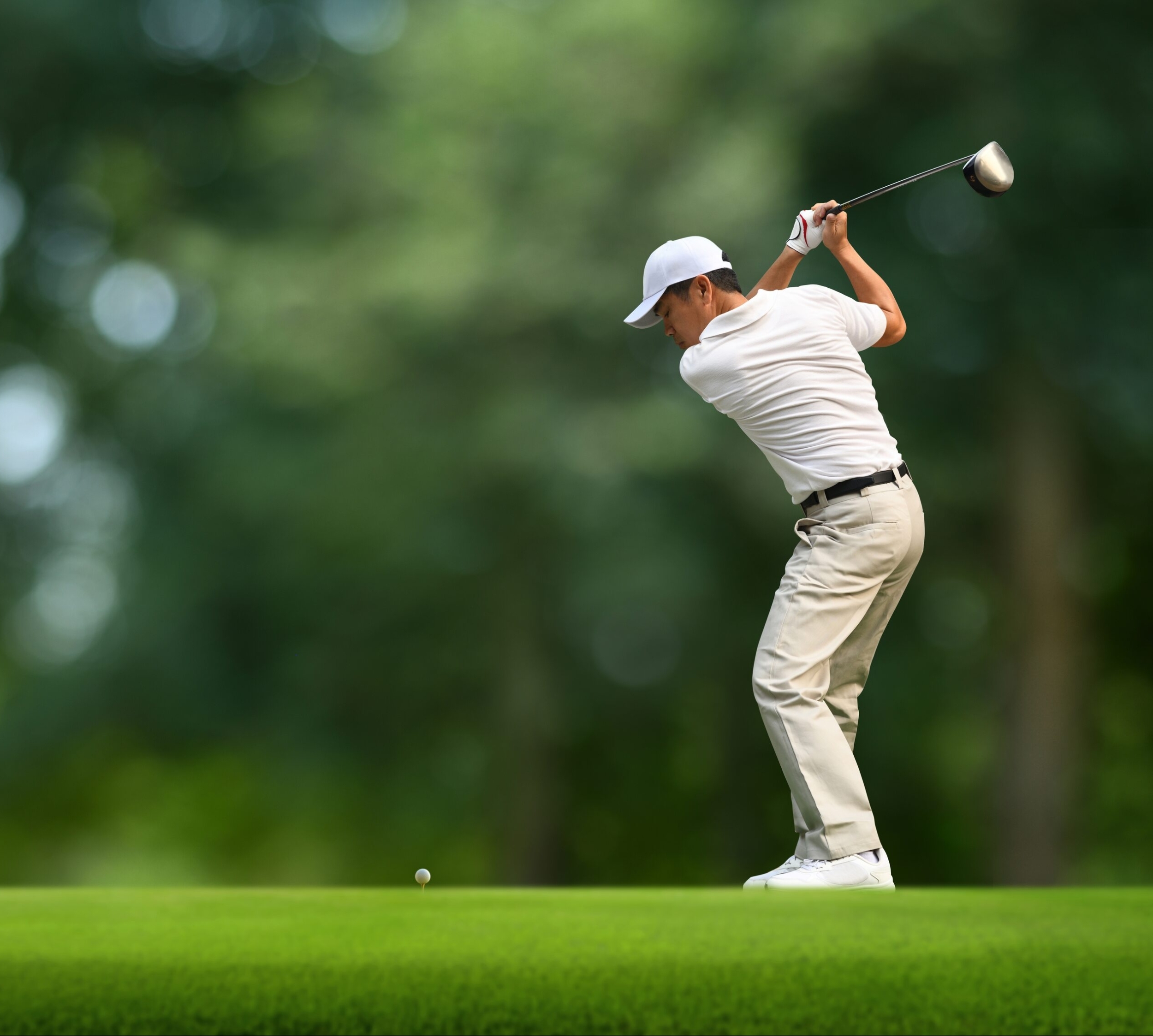 man swinging a golf-club